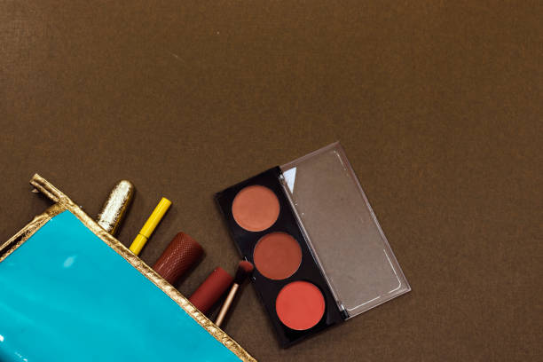 Securely wrapping eyeshadow palettes for travel in a suitcase
